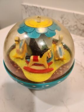 Fisher-Price Teal and Yellow Carousel Dome Toy